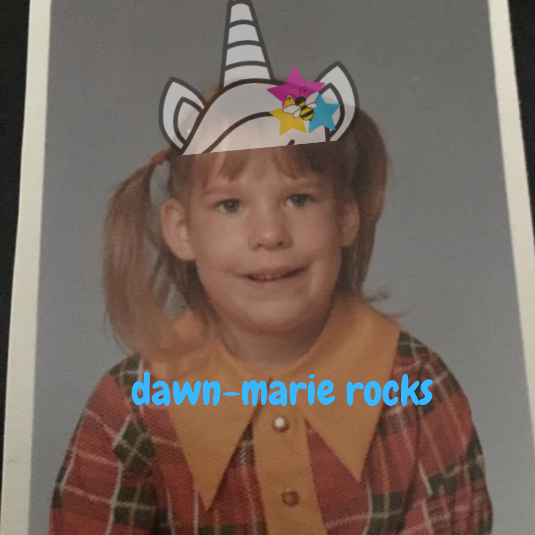 school picture of little girl with unicorn hat