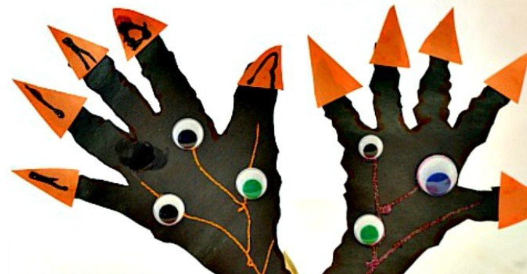 gloves decorated creepily with eyeballs and pointed nails
