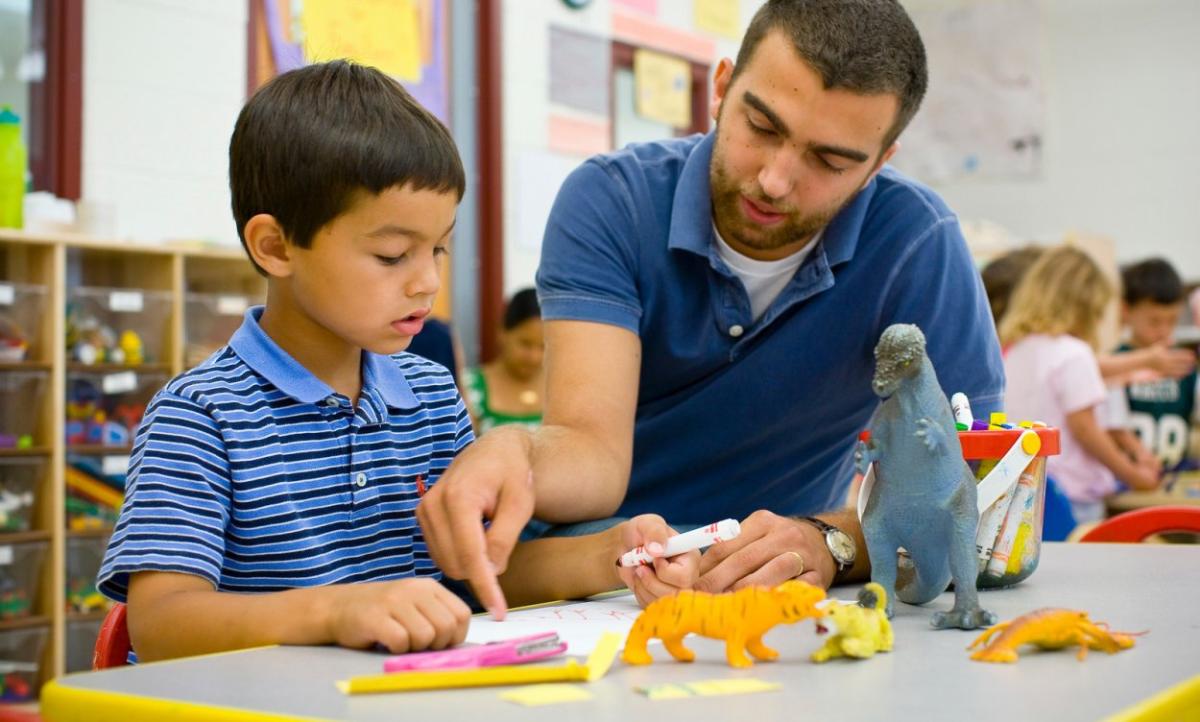 a man and boy doing a STEAM activity